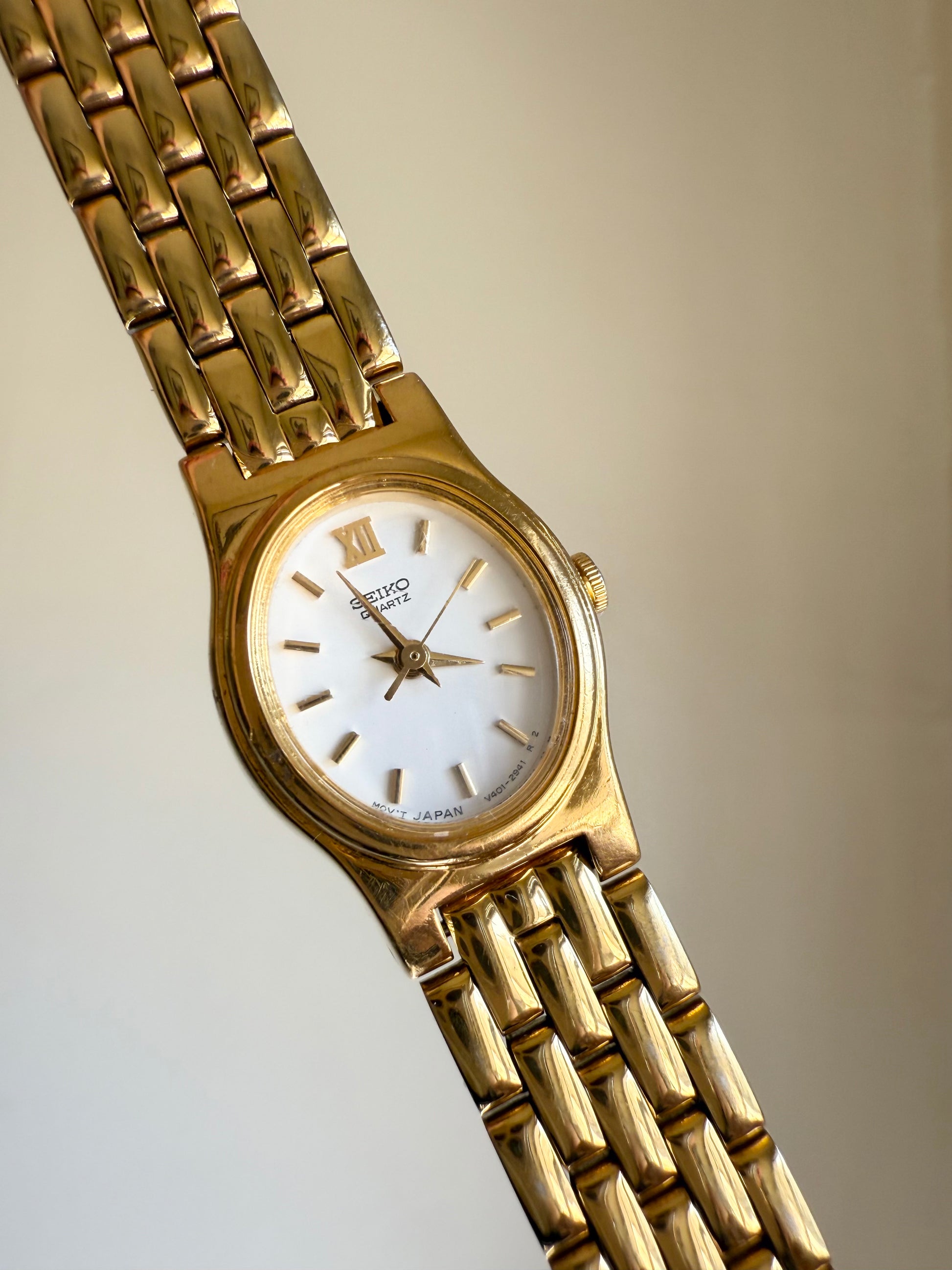 1994 Seiko Quartz Gold Tone White Dial Watch