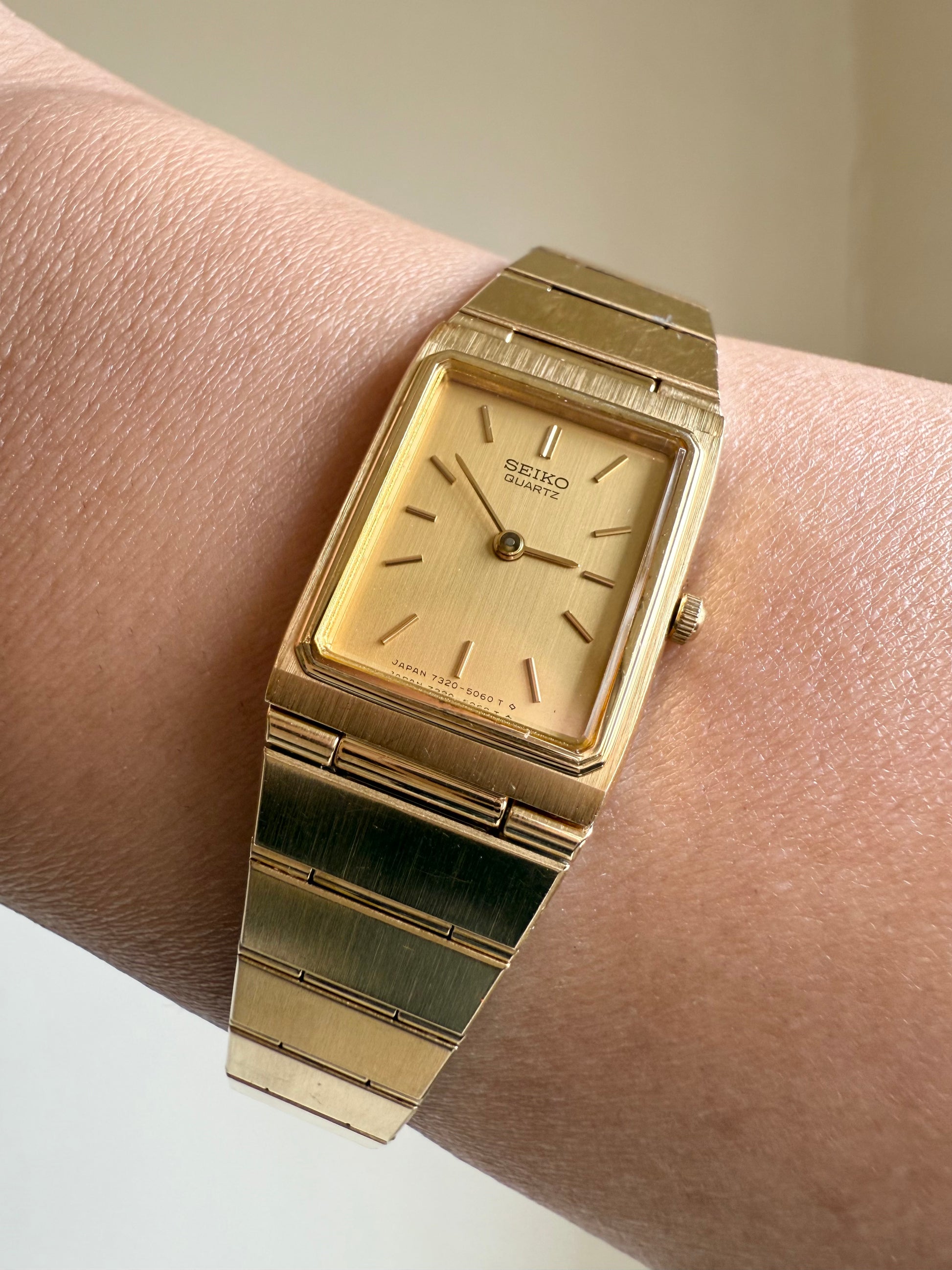 1982 Seiko Quartz Gold Tone Gold Dial Tank Watch