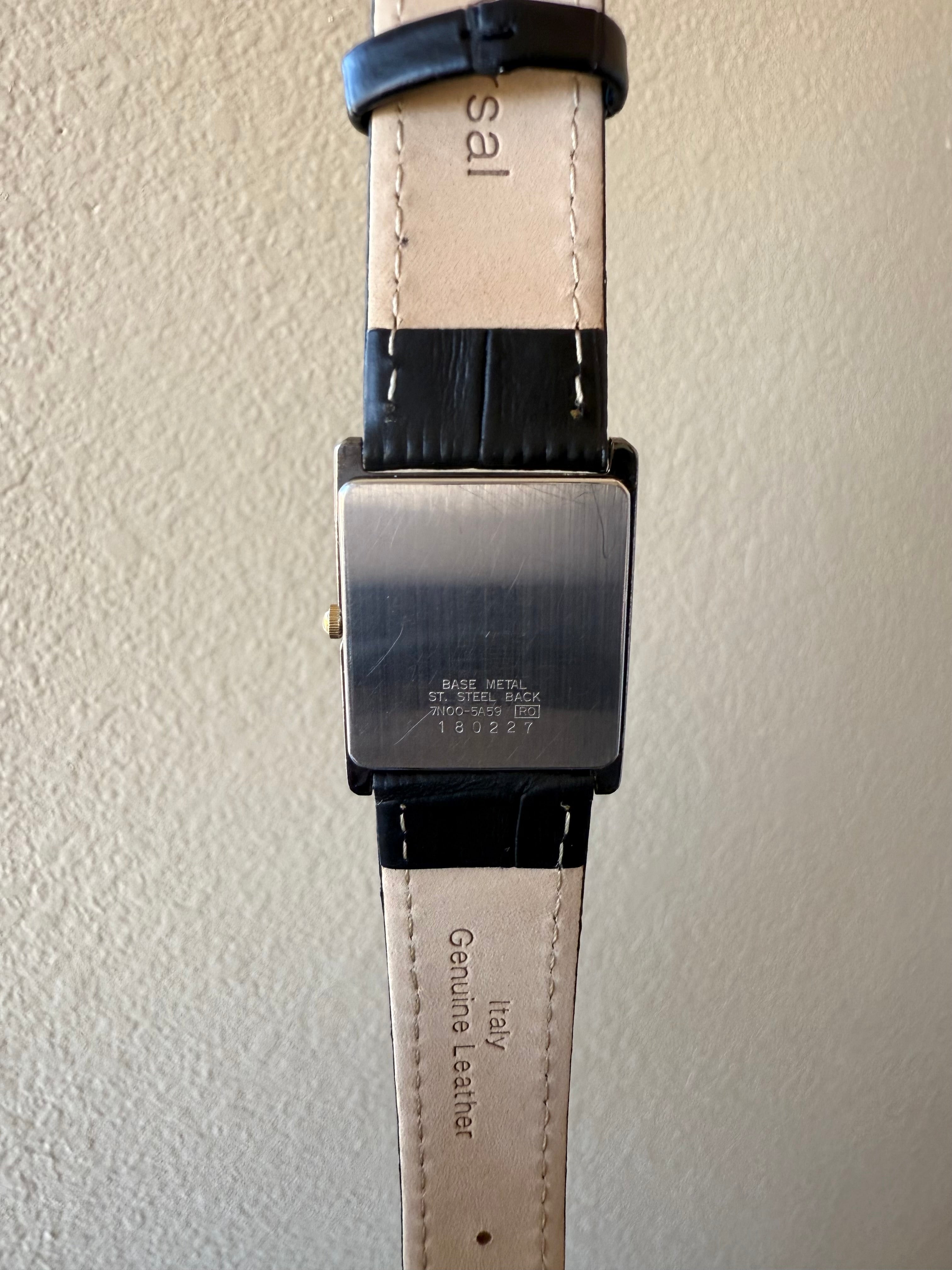 Vintage Seiko Quartz Black and Gold Tone Black Dial Watch – River