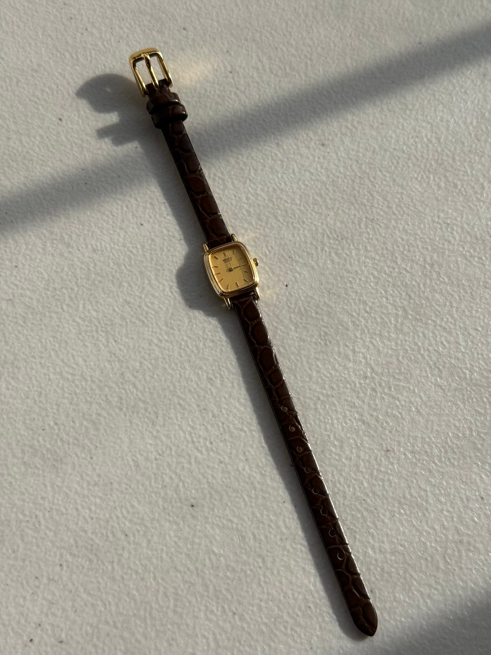 1989 Seiko Quartz Gold Tone Barrel Tank Watch