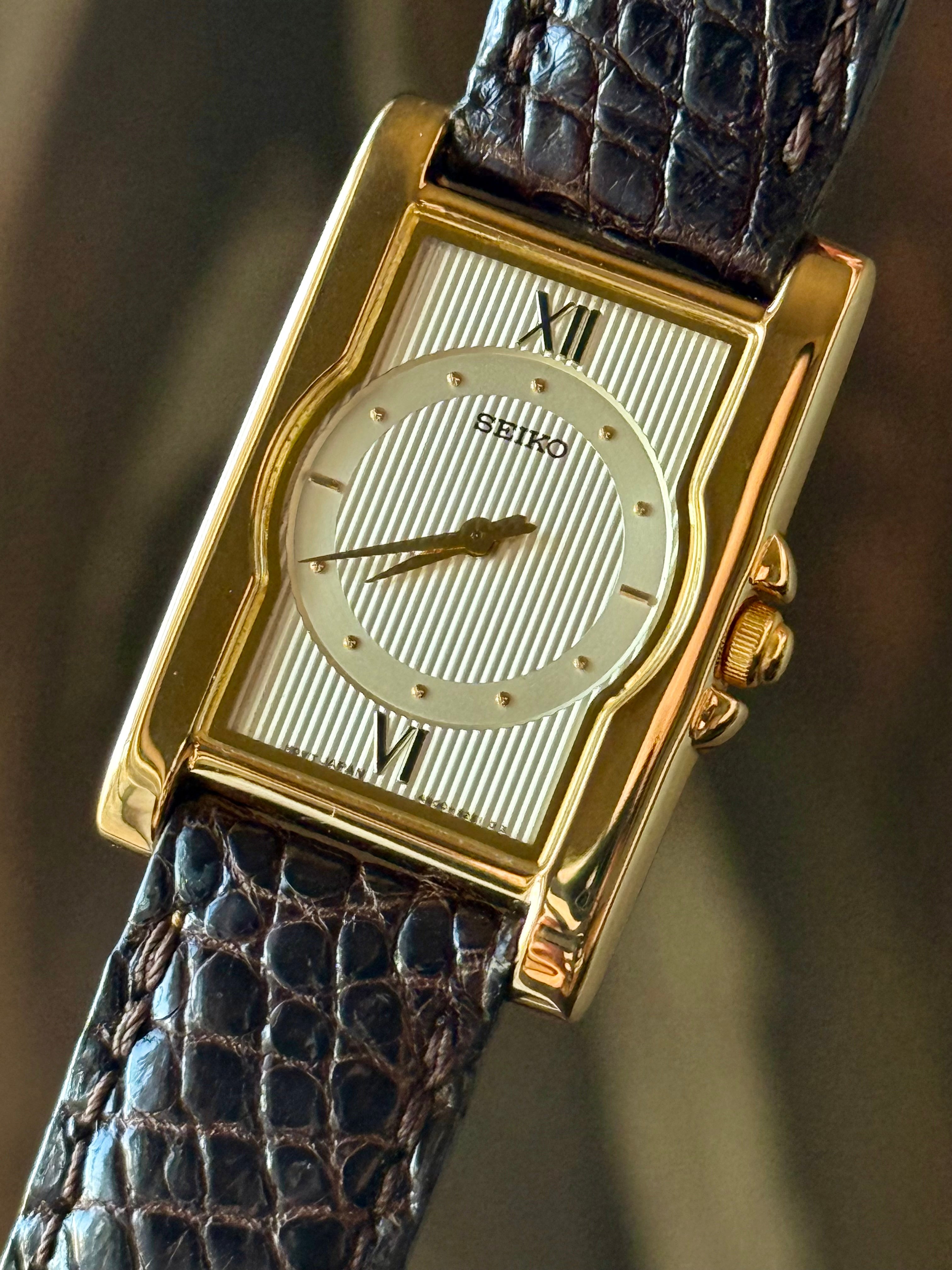 1988 Seiko Quartz (NOS) Gold Tone Tank Watch - brown + red band
