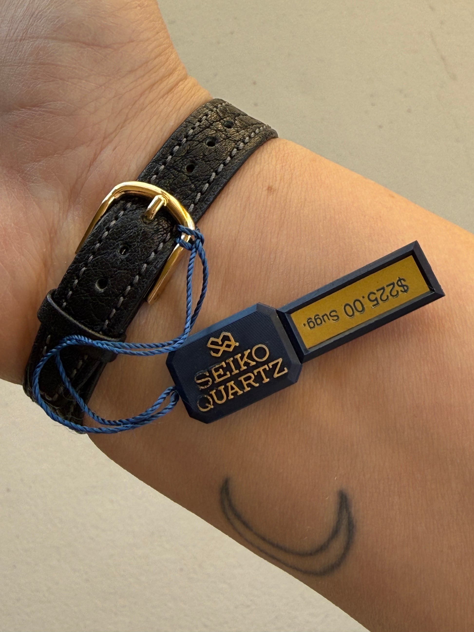 1997 Seiko Quartz (NOS) Gold Tone Tank Watch