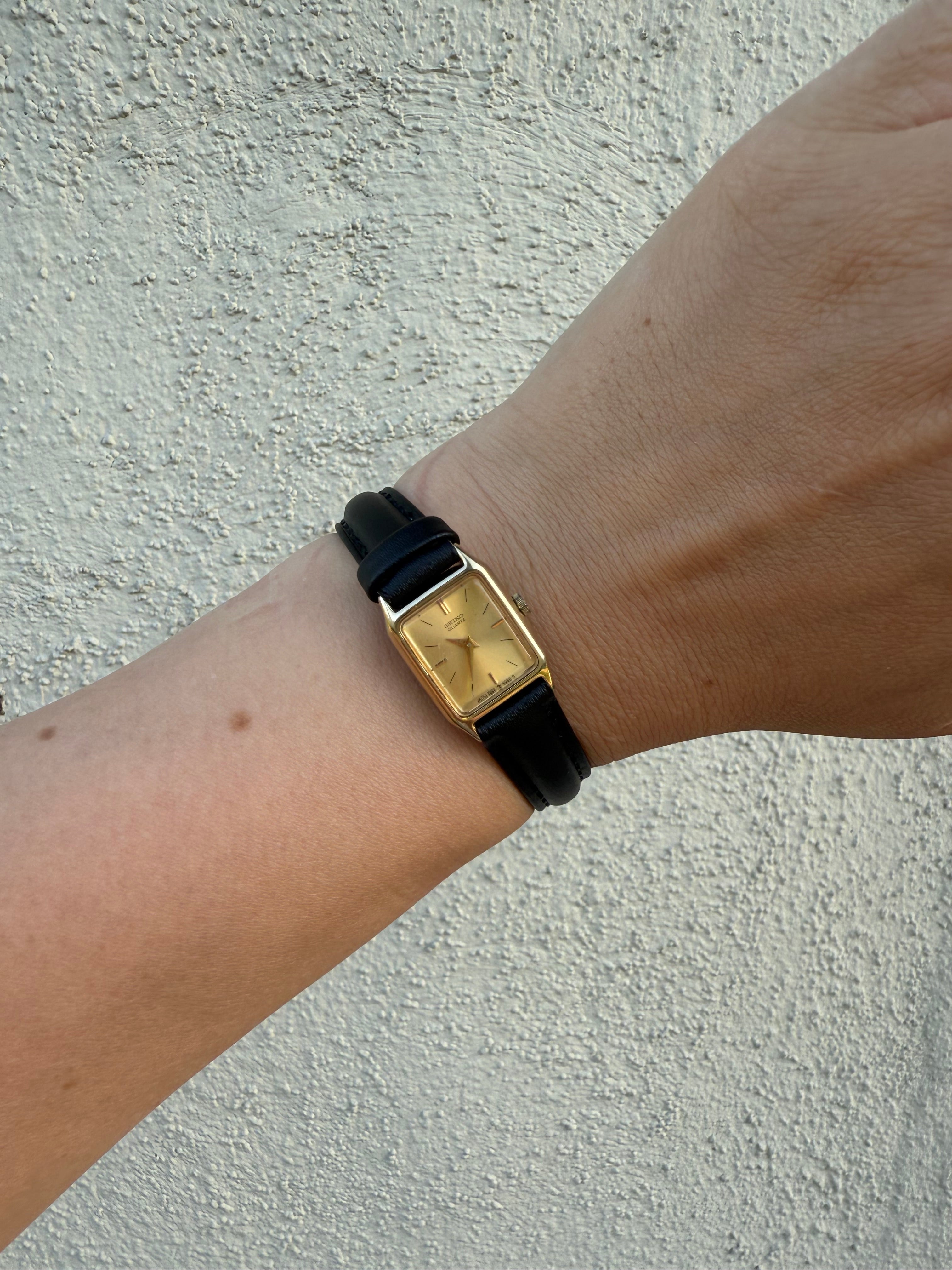 1988 Seiko Quartz Gold Tone Gold Dial Tank Watch