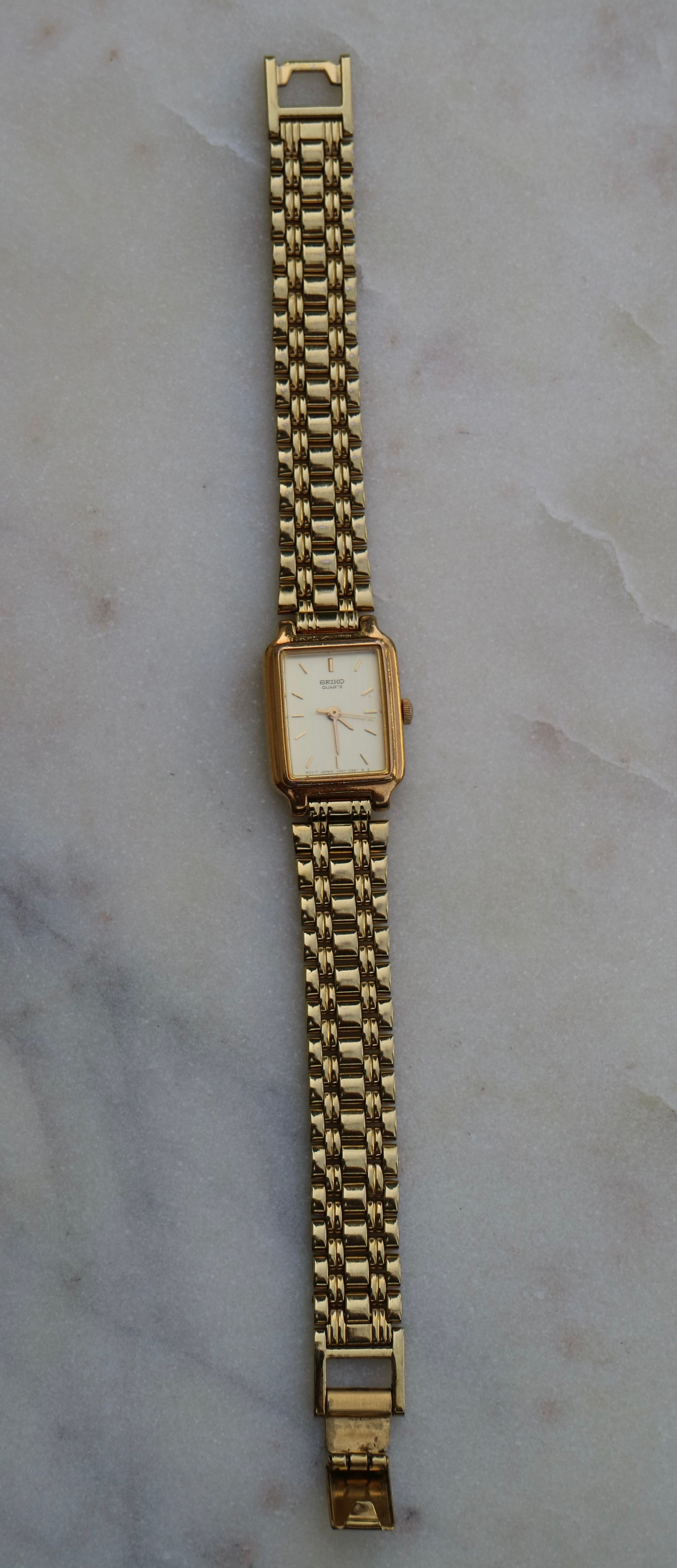 Seiko Vintage Women's 17mm Gold Tone Tank Watch with Gold Dial