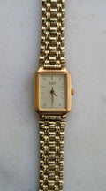 Seiko Vintage Women's 17mm Gold Tone Tank Watch with Gold Dial