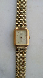 Seiko Vintage Women's 17mm Gold Tone Tank Watch with Gold Dial
