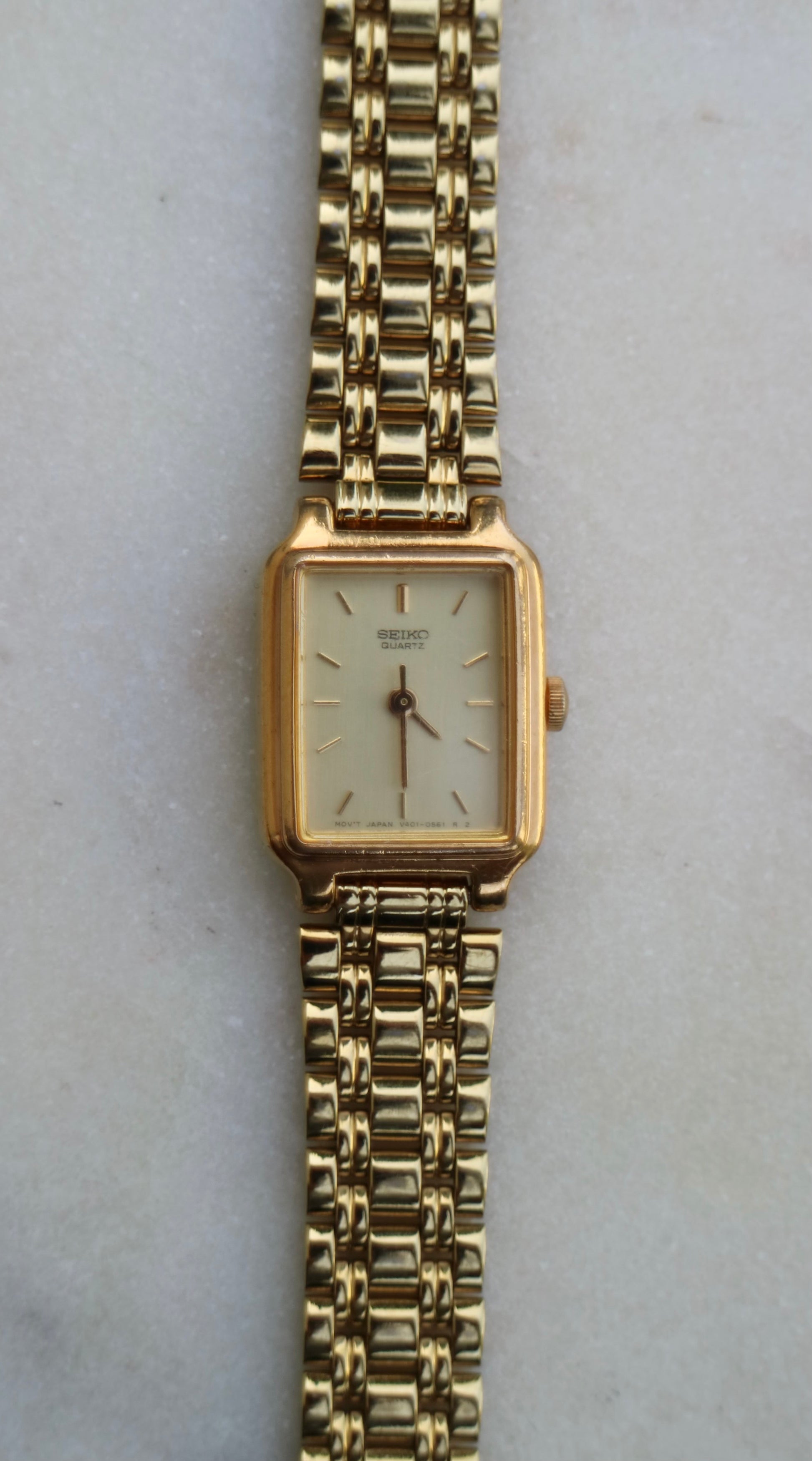 Seiko Vintage Women's 17mm Gold Tone Tank Watch with Gold Dial