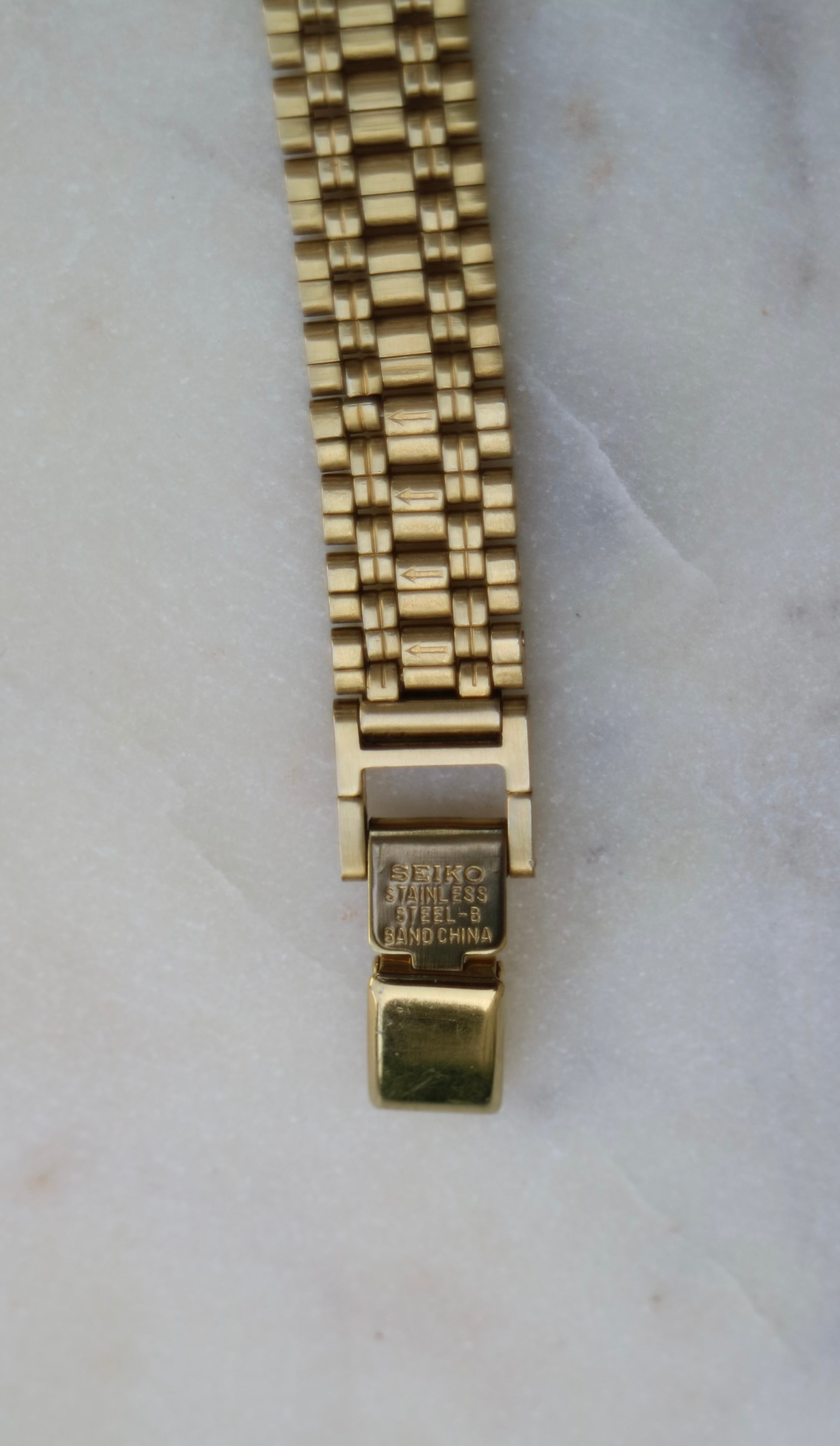 Seiko Vintage Women's 17mm Gold Tone Tank Watch with Gold Dial