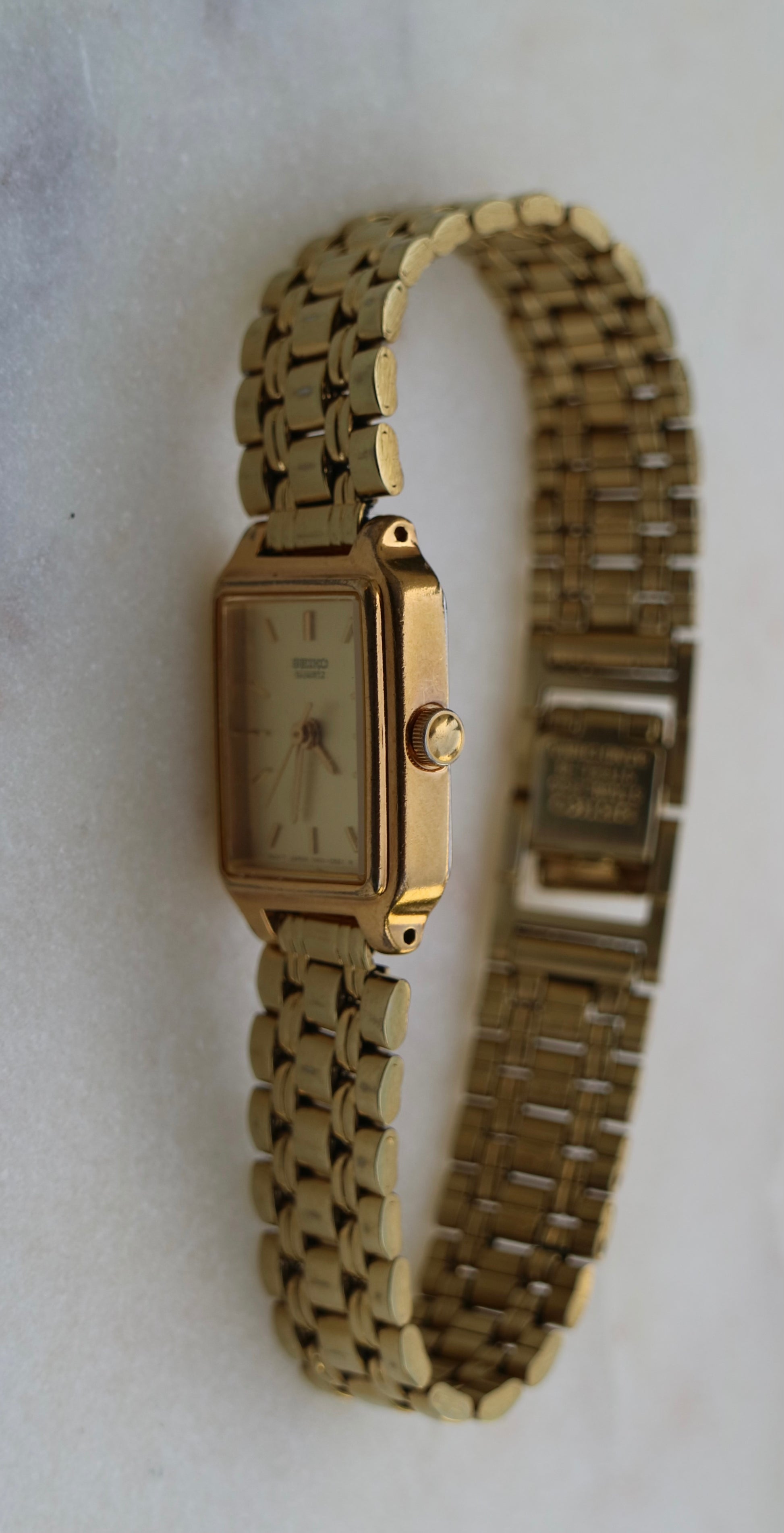 Seiko Vintage Women's 17mm Gold Tone Tank Watch with Gold Dial