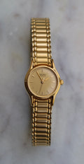 Seiko Vintage Quartz Women's Watch – 1N01-0E19 Gold Tone Stretch Band, Classic Analog Display, New Battery Installed