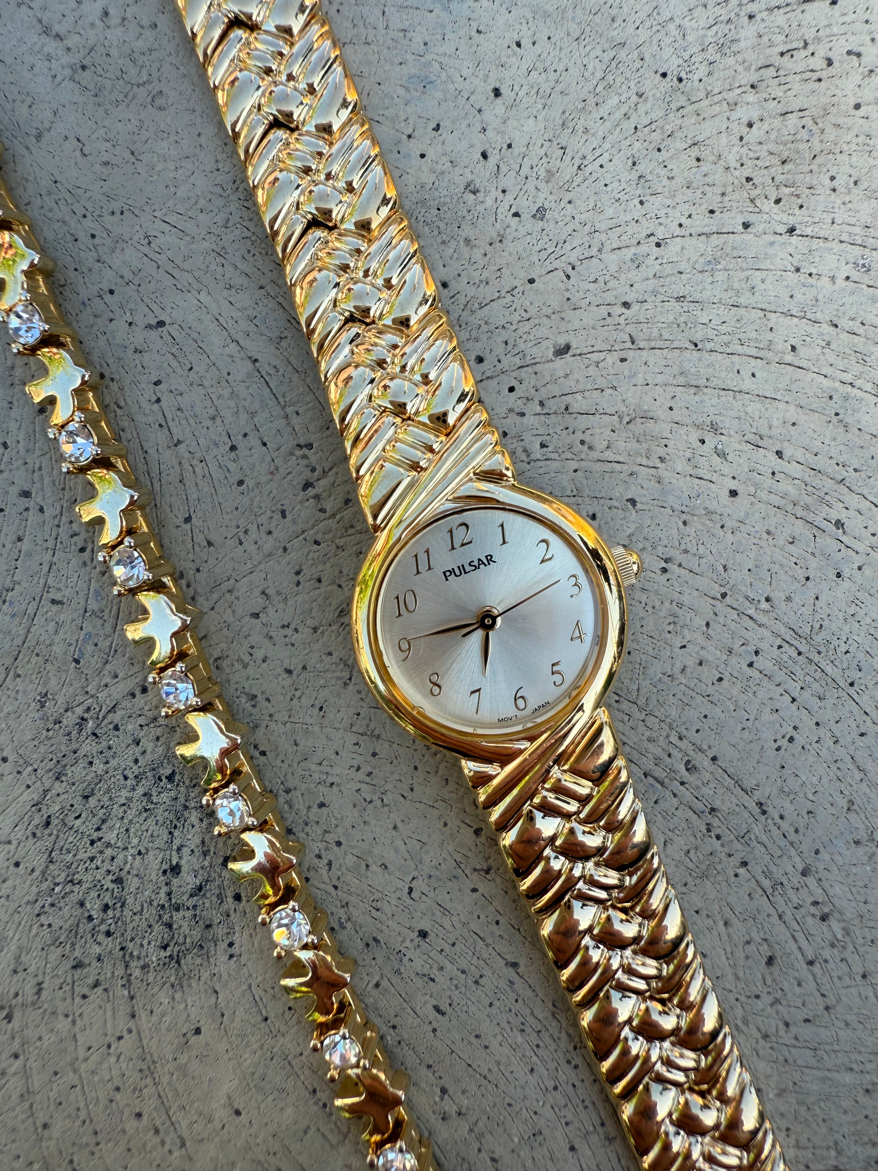 1990's Pulsar by Seiko Gold Tone Gold Dial Watch