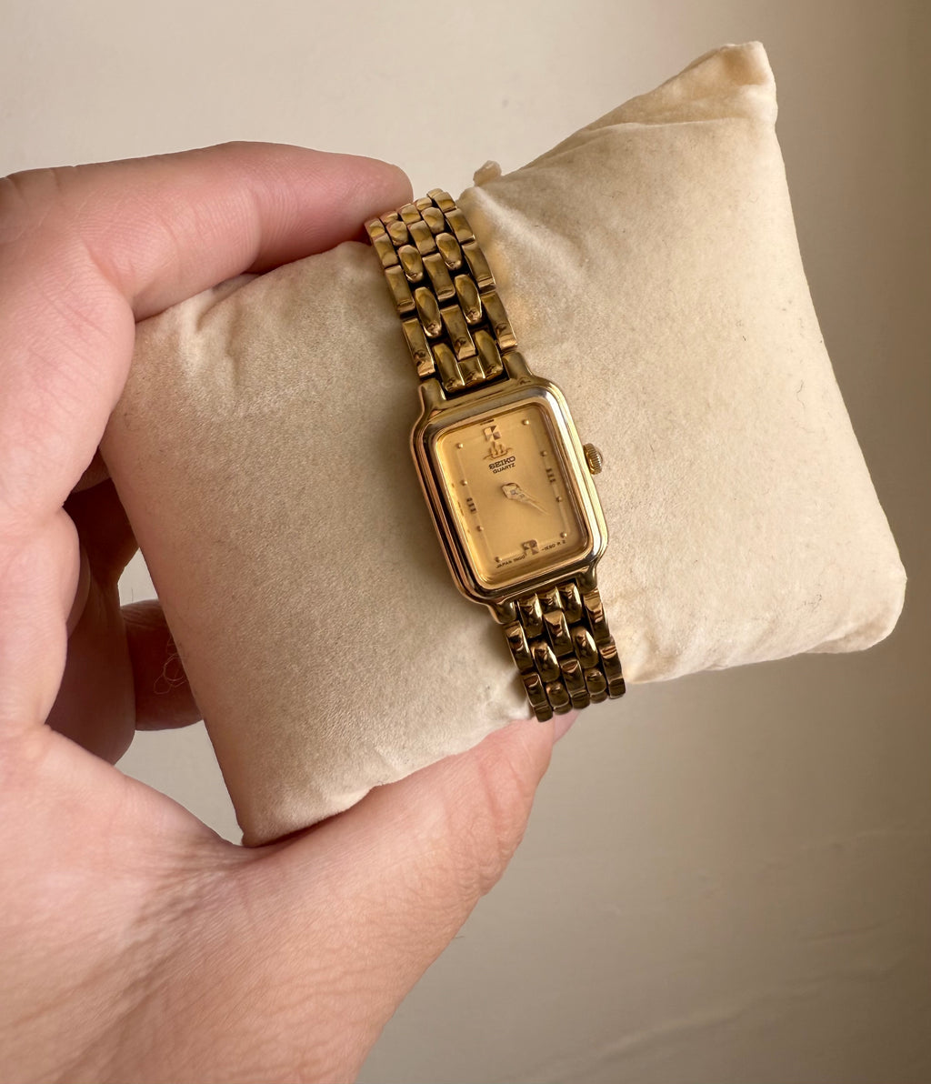 1990 Seiko Galaxy Quartz Gold Tone Gold Dial Tank Watch
