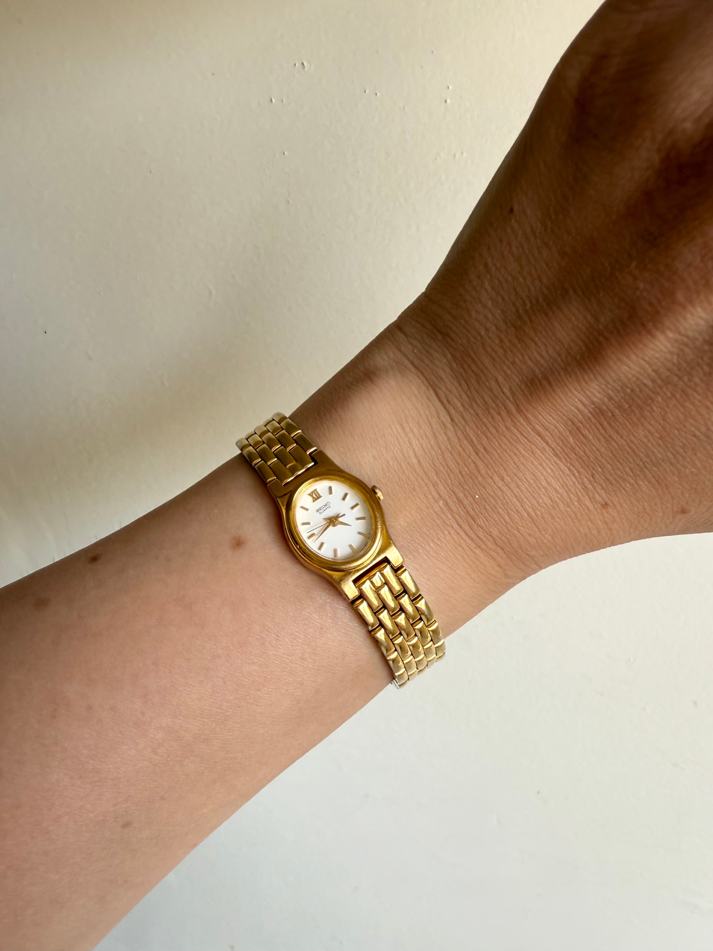 1994 Seiko Quartz Gold Tone White Dial Watch
