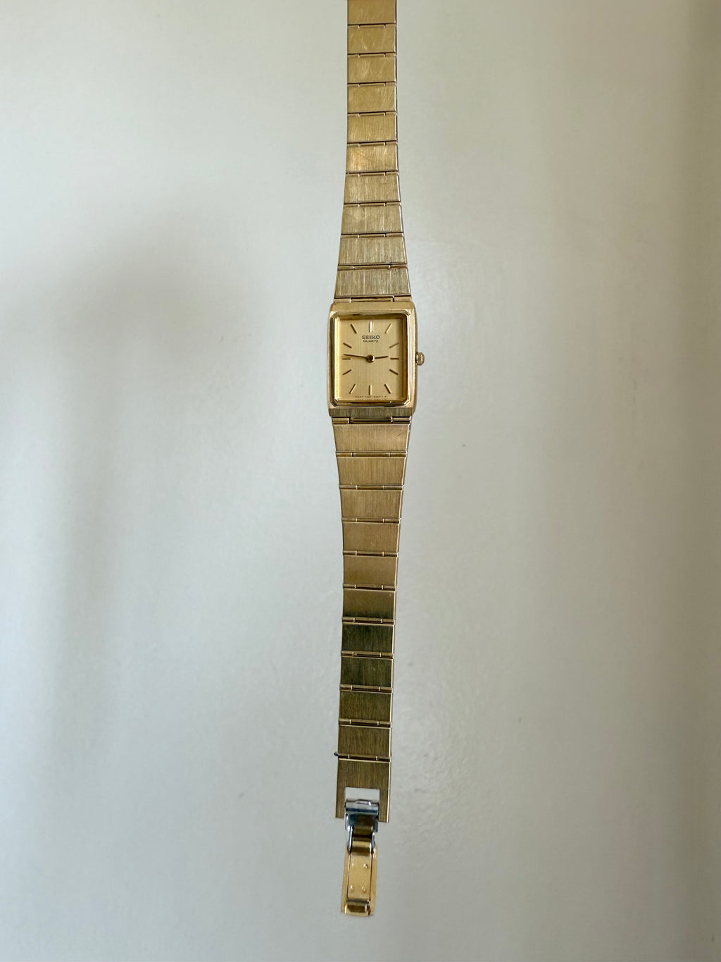 1982 Seiko Quartz Gold Tone Gold Dial Tank Watch