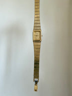 1982 Seiko Quartz Gold Tone Gold Dial Tank Watch