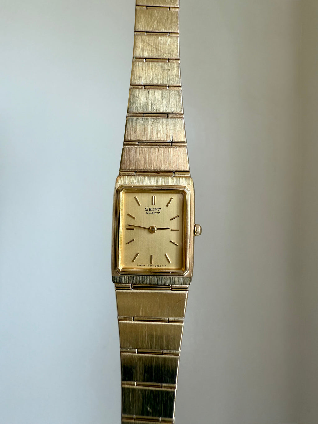 1982 Seiko Quartz Gold Tone Gold Dial Tank Watch