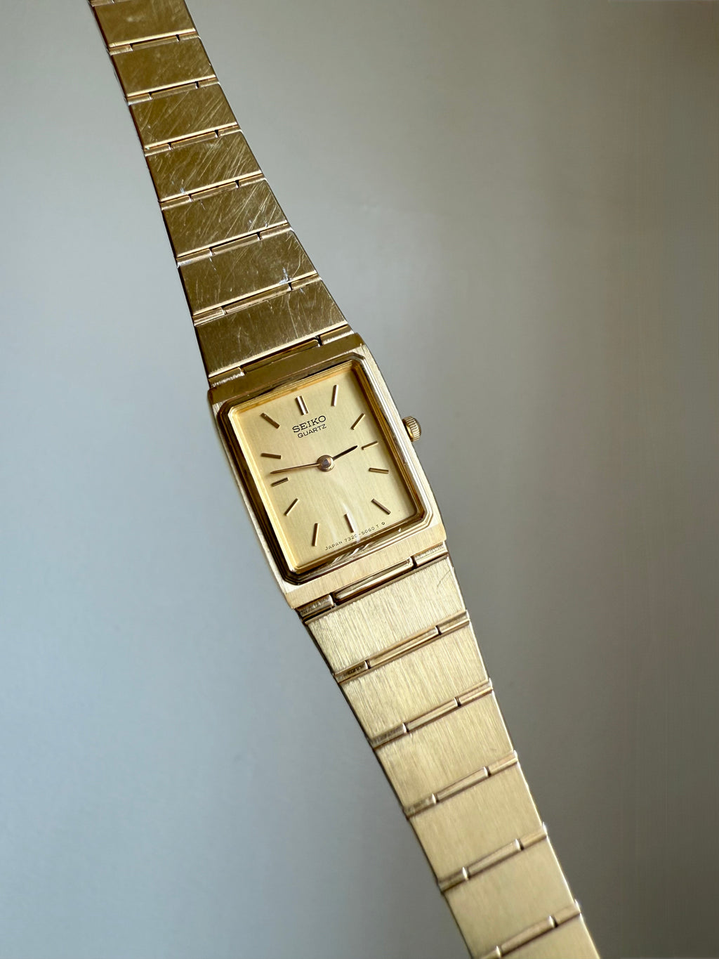 1982 Seiko Quartz Gold Tone Gold Dial Tank Watch