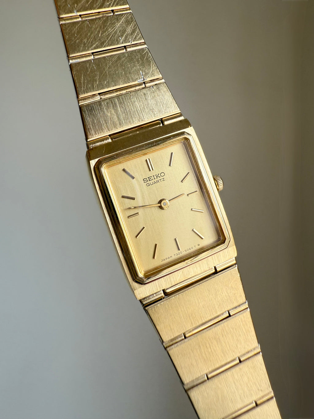 1982 Seiko Quartz Gold Tone Gold Dial Tank Watch