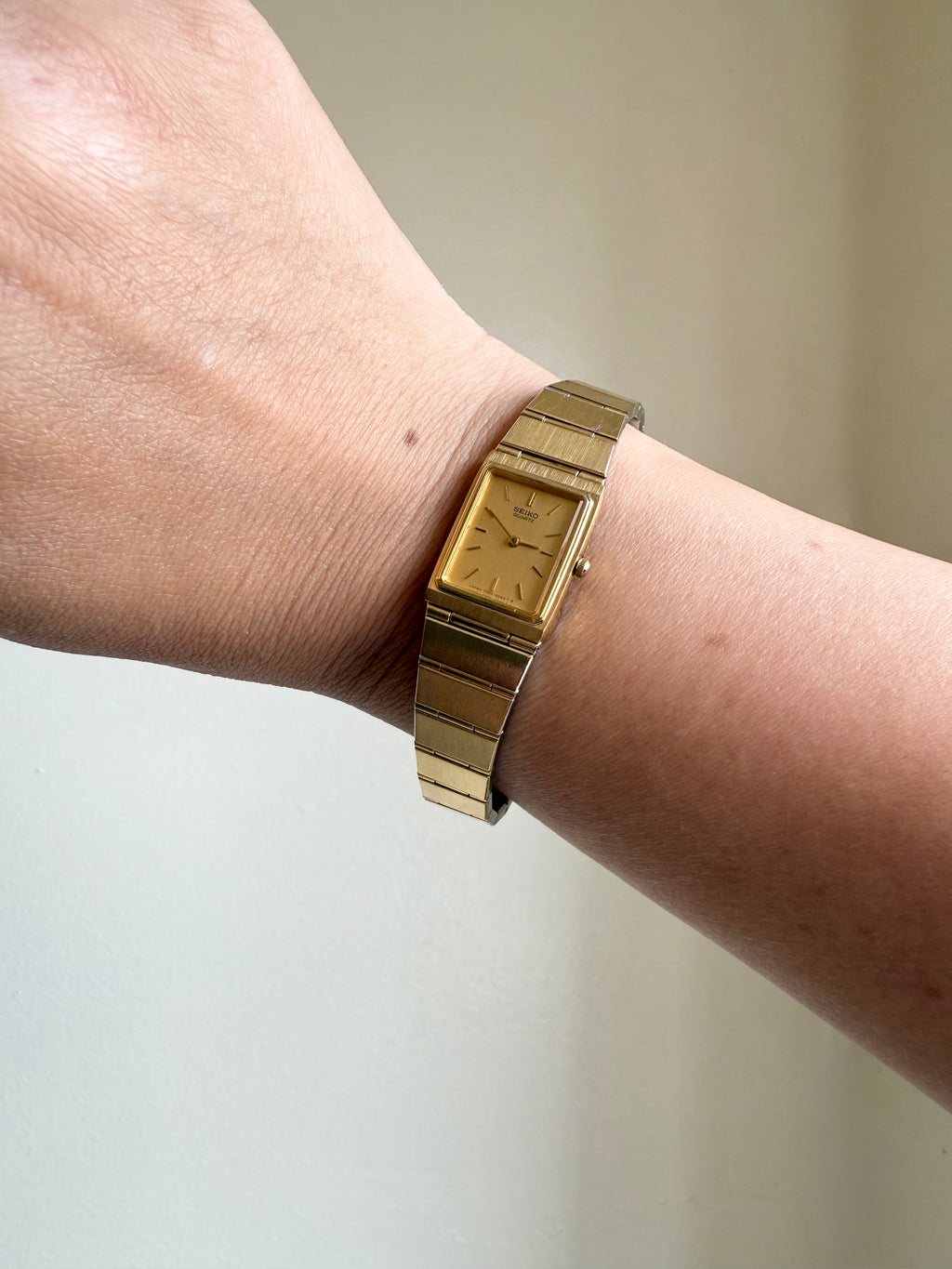 1982 Seiko Quartz Gold Tone Gold Dial Tank Watch