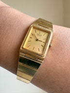 1982 Seiko Quartz Gold Tone Gold Dial Tank Watch